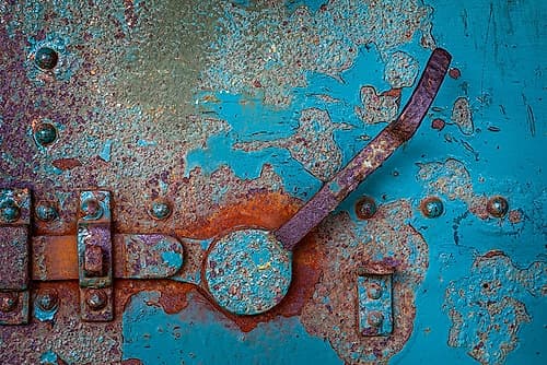 USA, Washington, Port Townsend, Fort Worden SP. Corroded metal door latch of old gun battery. Art Print